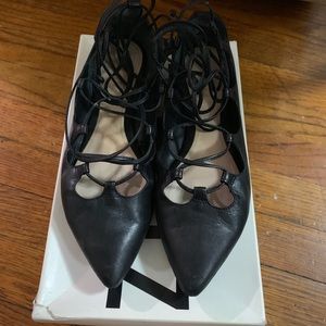 Schutz black flats
